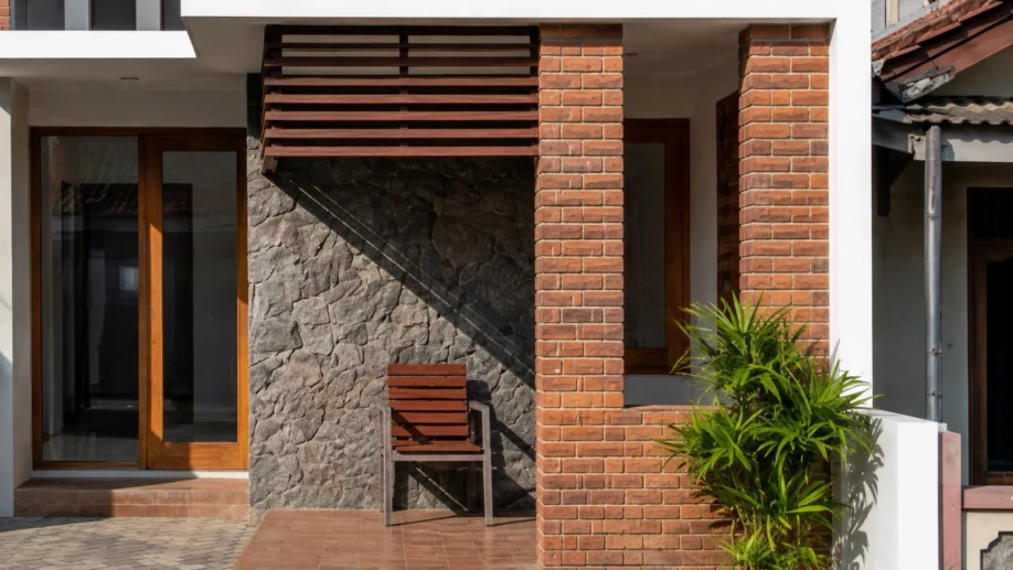 Desain Rumah Modern Tropis dengan Bata Ekspos dan Atap Miring - area pendukung