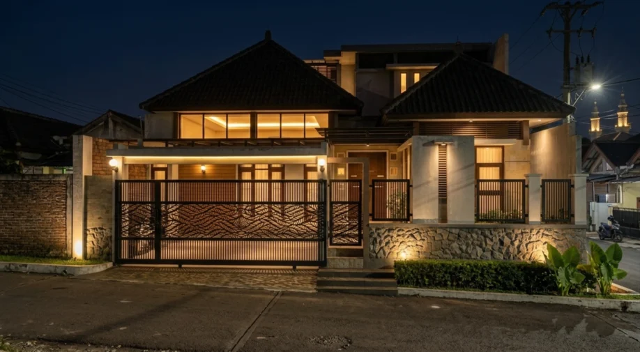 Rumah Tropis Modern dengan Material Alam dan Pagar Motif Daun - tampak eksterior